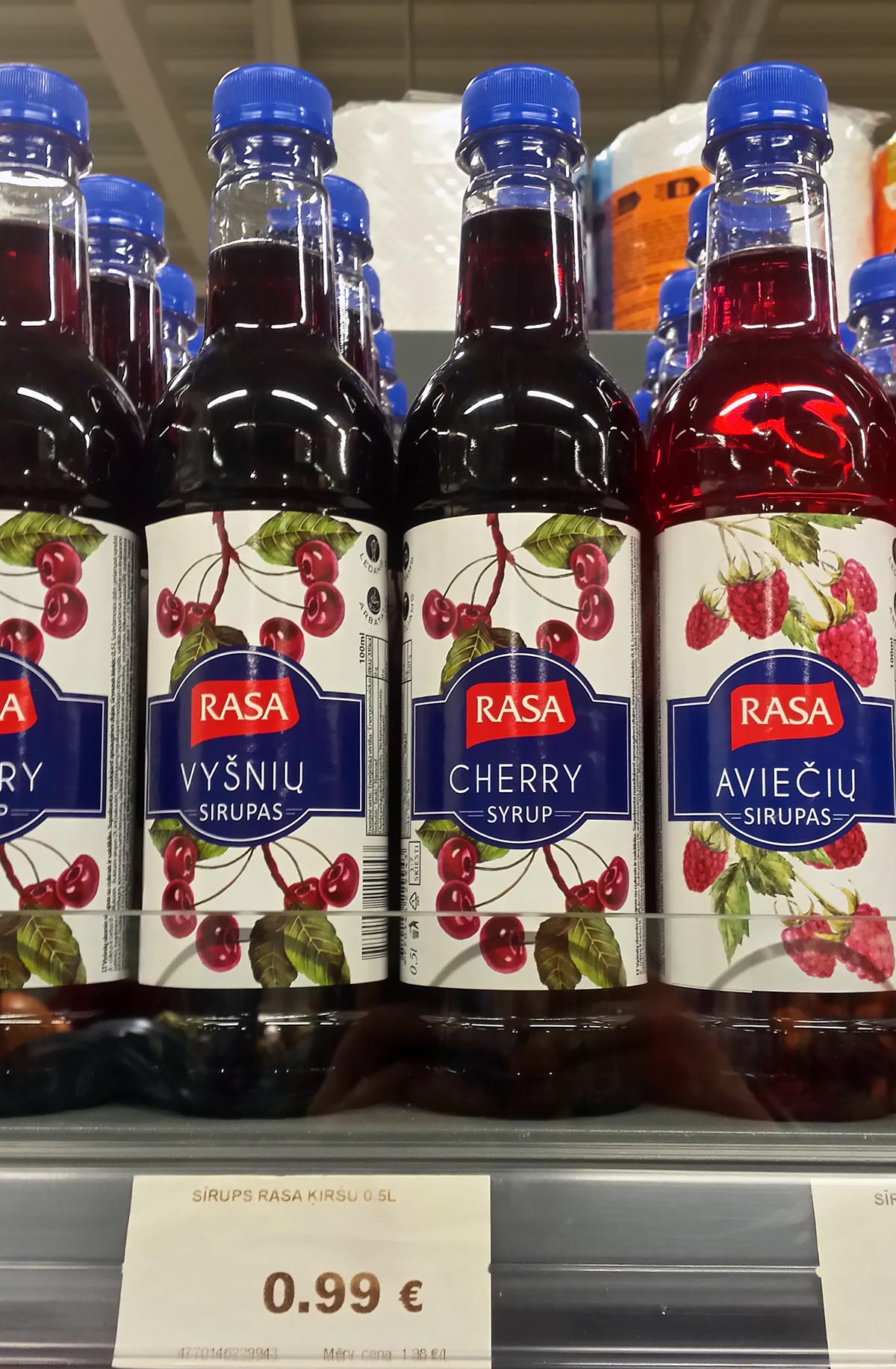 Cherry syrup in a grocery store.