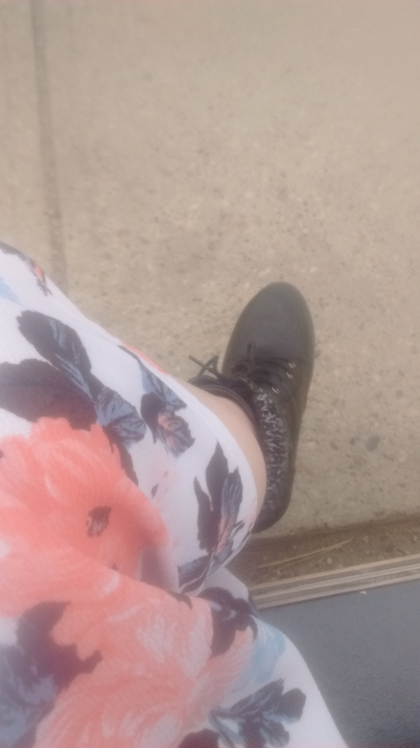 No flowery summer dress is complete without polished combat boots.