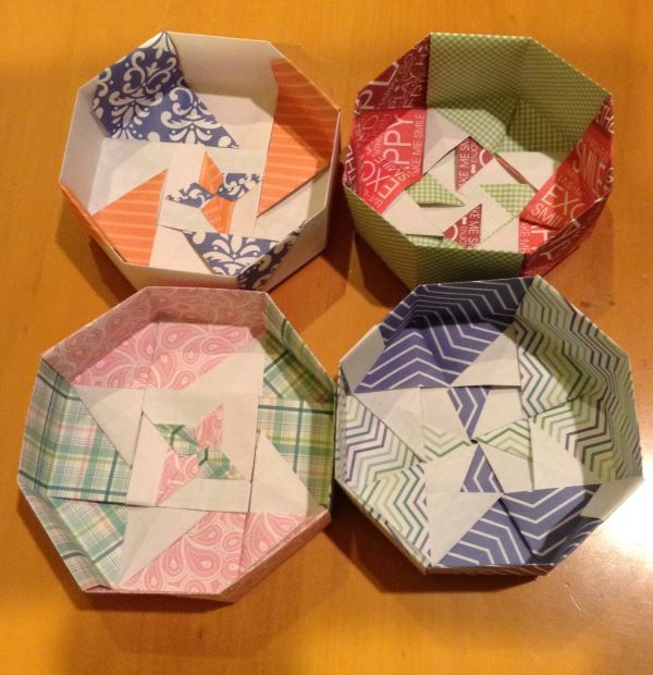 Four octagonal boxes (without covers)