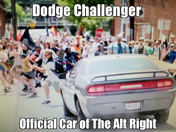 Superimposed over a photo of protesters fleeing an oncoming car: "Dodge Challenger: Official Car of the Alt Right."