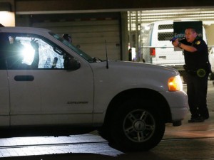 Cop "investigating" an innocent motorist after the Dallas shootings