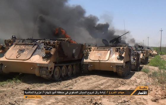 Abandoned M113s in Anbar Ambush