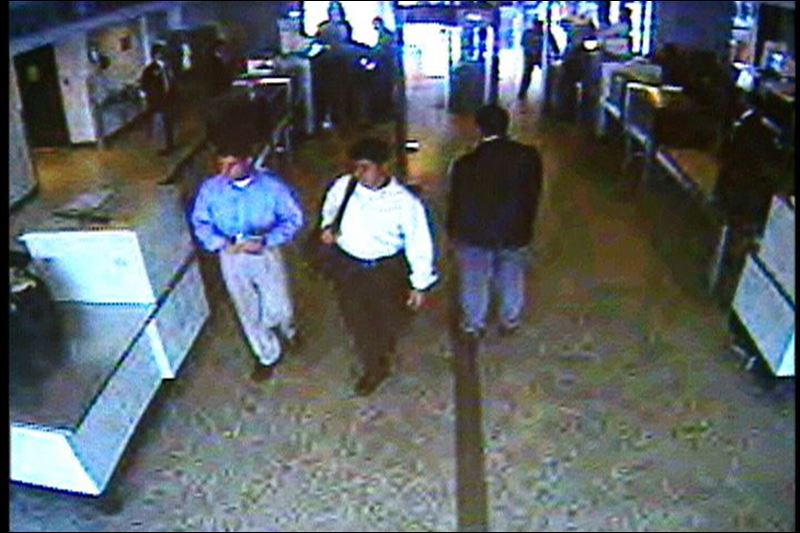 A couple of yuppies going through security 9/11